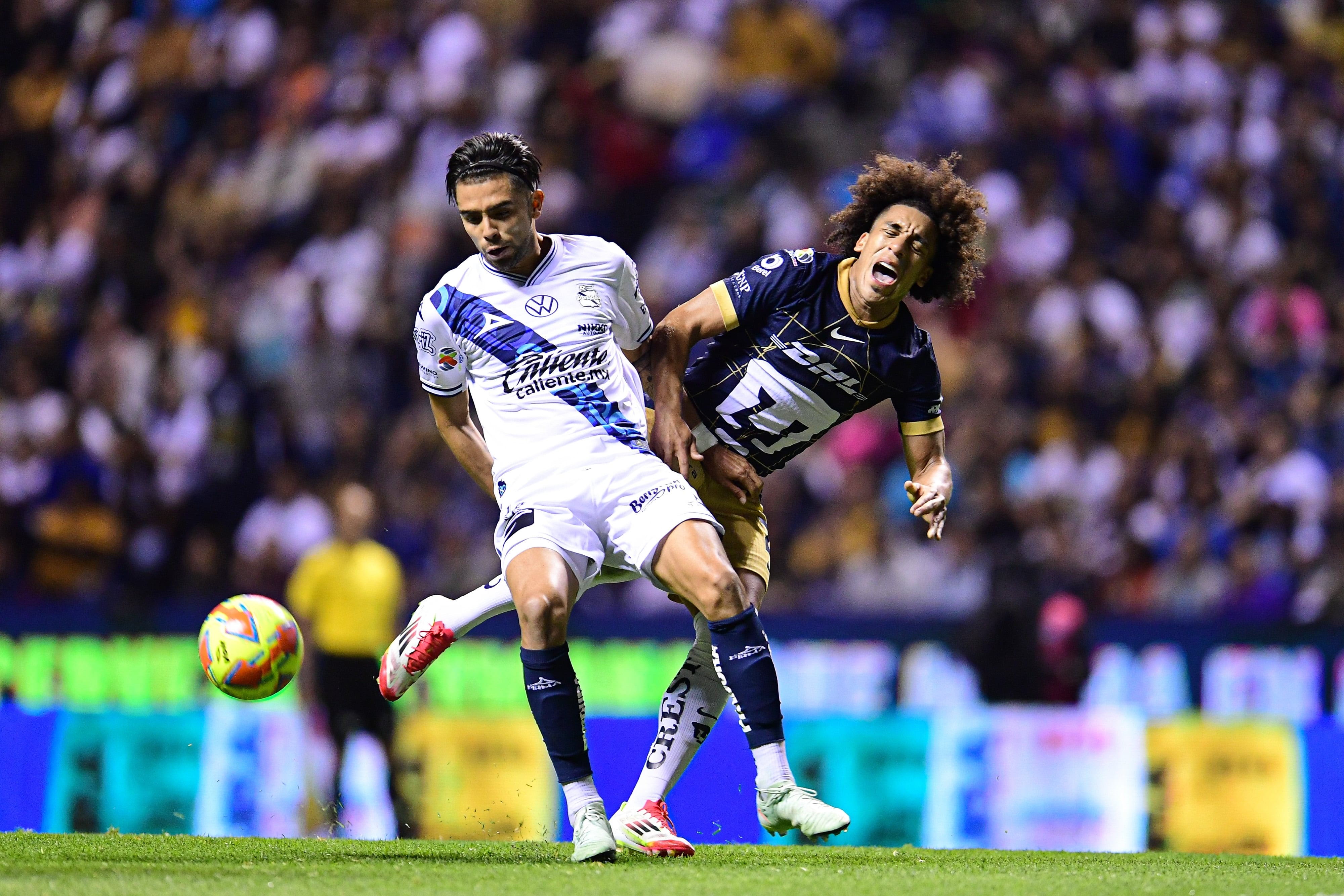 Ricardo Marín y Adalberto Carrasquilla en el Puebla vs Pumas.