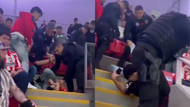 Captan cómo policía somete a un fan de Atlas en el Clásico Tapatío