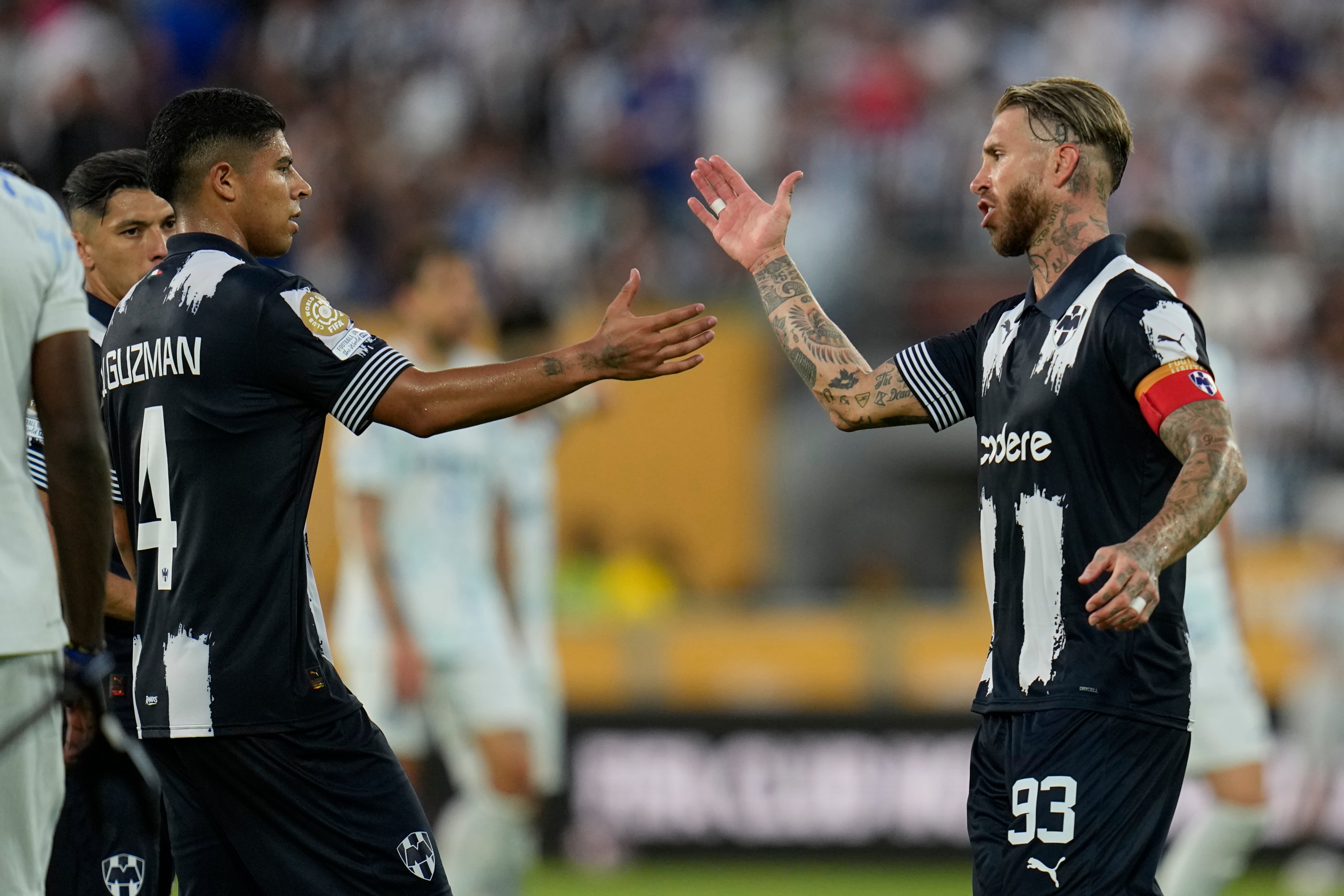 Víctor Guzmán y Sergio Ramos.